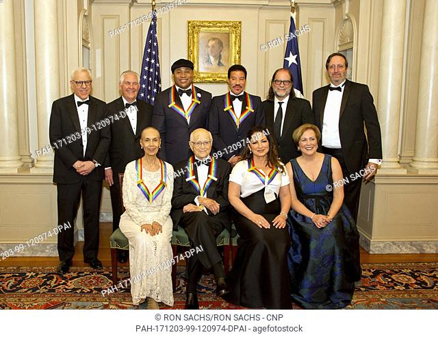 The five recipients of the 40th Annual Kennedy Center Honors pose for a group photo following a dinner hosted by United States Secretary of State Rex Tillerson...