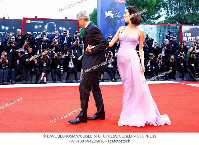 George Clooney and his wife Amal Alamuddin attending the 'Suburbicon' premiere at the 74th Venice International Film Festival at the Palazzo del Cinema on...