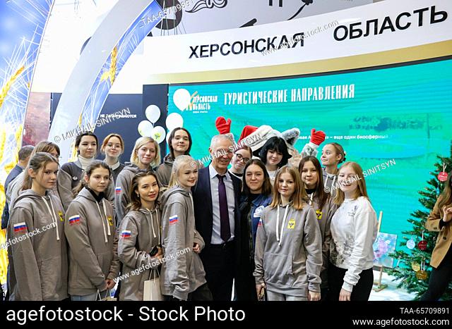 RUSSIA, MOSCOW - DECEMBER 13, 2023: Kherson Region Governor Vladimir Saldo (C) poses for a group photo during a Kherson Region Day event at the Russia Expo...