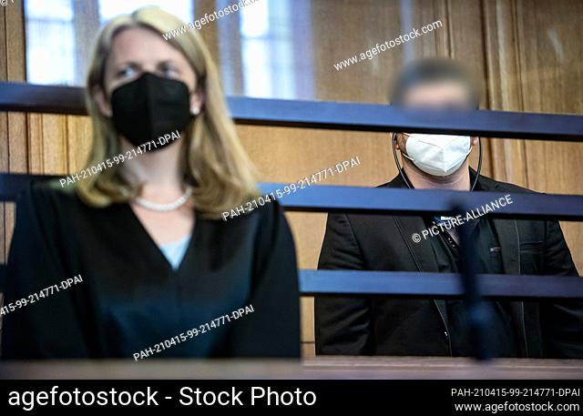 15 April 2021, Berlin: The defendant in the trial of an Islamist-motivated attack on Berlin's city highway, stands behind his lawyer Heidi Schairer (l) in the...