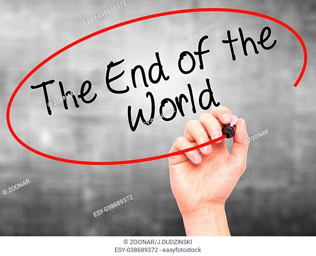 Man Hand writing The End of the World with black marker on visual screen