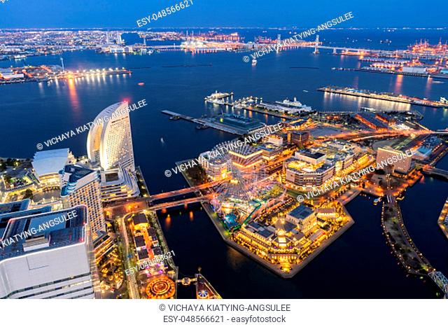 Aerial view of panoramic modern city in Yokohama City Japan with blue hour after sunset in th evening. Yokohama is the second largest city in Japan by...