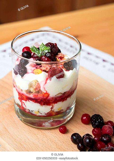 Greek yogurt with cereal and fruits