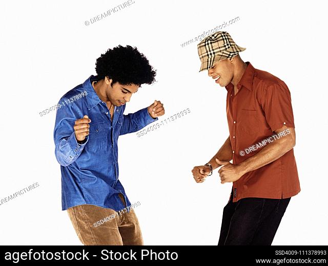 Two young men dancing