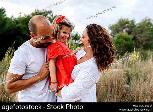 Cheerful family enjoying at countryside