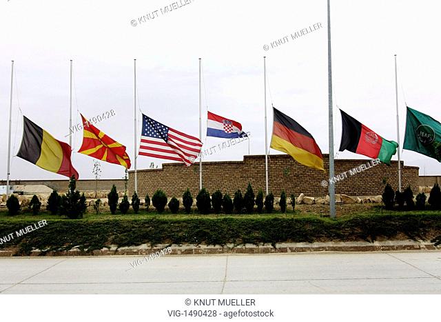 Flags at the cenotaph in the German armed forces bivouac of the PRT-Kunduz. - Kunduz, Kunduz, Afghanistan, 15/06/2009