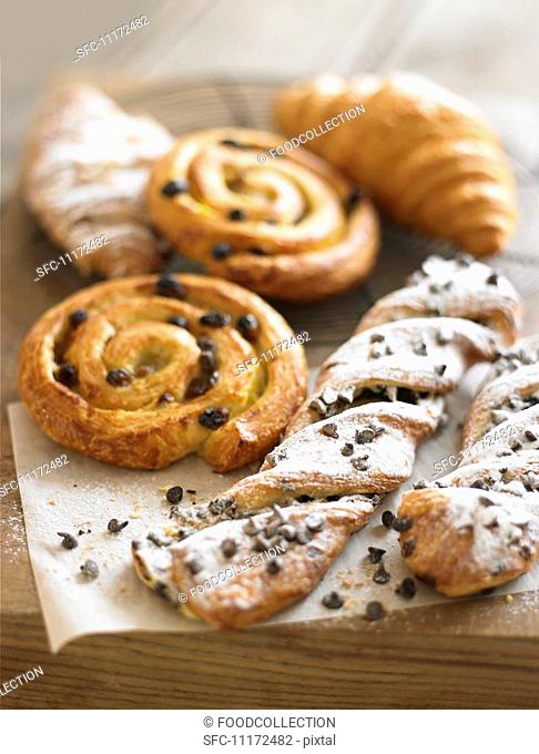 Raisin whirls, croissants and chocolate-chip puff pastry twists