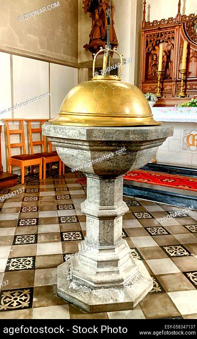 Baptism font in a catholic or christian church