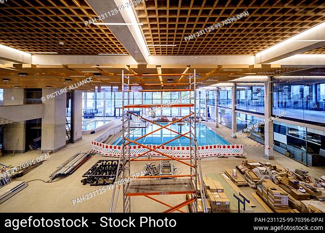 PRODUCTION - 24 November 2023, Hesse, Bad Nauheim: The pool in the indoor swimming pool is filled with water for the leak test