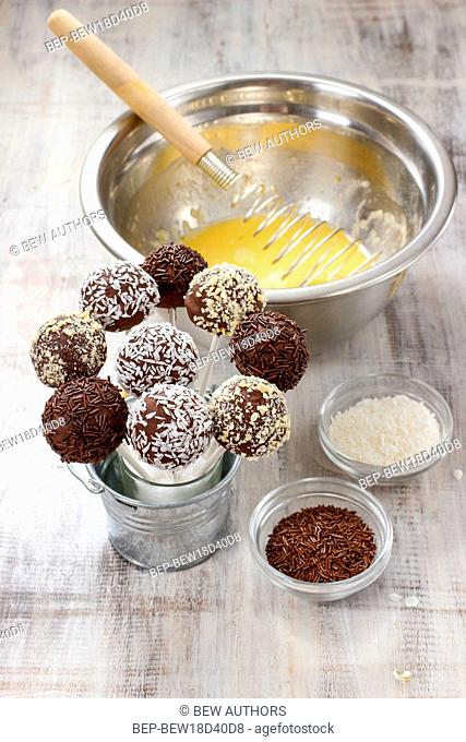 Chocolate cake pops in silver bucket. Party dessert