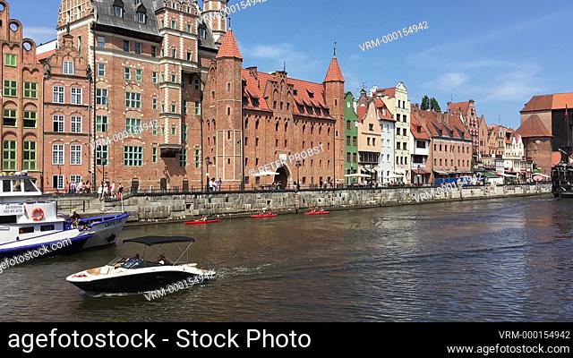 Old town of Gdansk with pedestrians in the Long market in front of the Golden Gate - Poland
