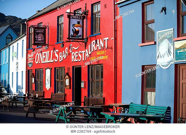 Colorful row of houses with O'Neill's Restaurant, Allihies, Ring of Beara, Ireland, Europe