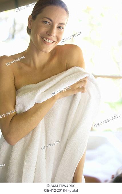 Woman toweling off in spa