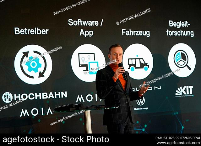 23 October 2023, Hamburg: Sascha Meyer, CEO of Moia, speaks at Hochbahn's Alsterdorf depot during the handover of a funding notification for the ""Alike""...