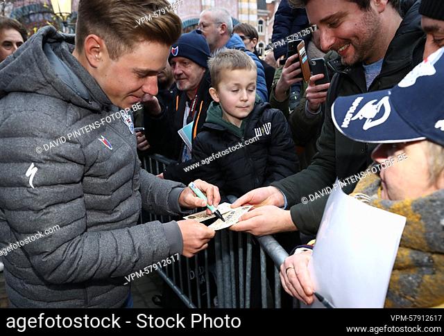 Belgian Remco Evenepoel pictured with some fans during the team presentation of the Soudal Quick-Step cycling team in De Panne, Friday 06 January 2023