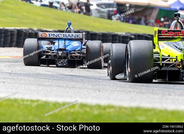 June 23, 2019 - Elkhart Lake, Wisconsin, USA: SCOTT DIXON (9) of New Zealand races through the turns during the race for the REV Group Grand Prix at Road...