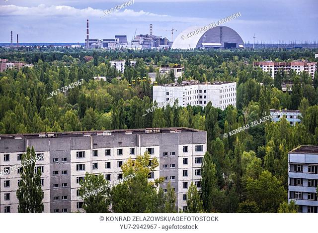 Aerial view of Pripyat ghost city, Ukraine. View with New Safe Confinement of Chernobyl Nuclear Power Plant