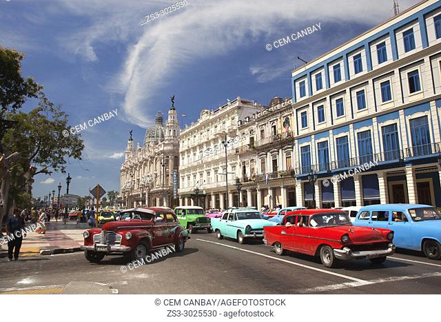 Old American cars in front of the colonial Hotel Telegrafo, Hotel Inglaterra and Great Theater-Gran Teatro at Center Havana, La Habana, Cuba, Central America