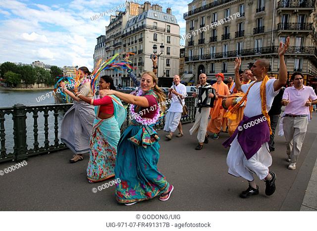 ISKCON devotees performing a harinam (devotional walk with dancing and chanting) in Paris