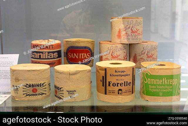 Bergisch Gladbach, Germany, 25. 08. 2020: Toilet paper rolls of various brands are displayed in a showcase in the LVR Industrial Museum Papiermuehle Alte...