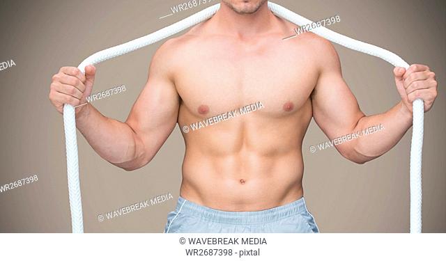 Composite image of Fitness Torso against grey background