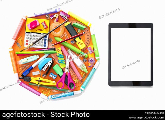 E-learning online learning with tablet PC and school supplies isolated on white
