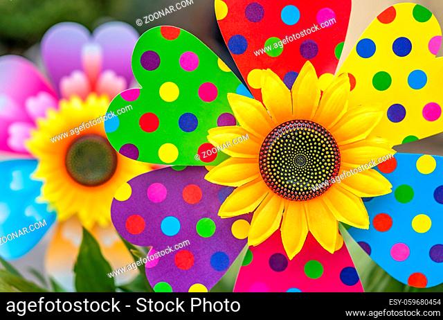 Large colorful artificial decorative sunflower fan on display for sale