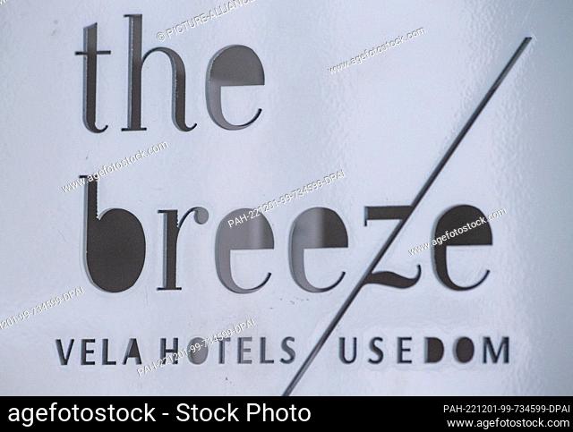 30 November 2022, Mecklenburg-Western Pomerania, Ahlbeck: ""the breeze"" stands at the construction site of the new hotel apartment complex on the seafront in...