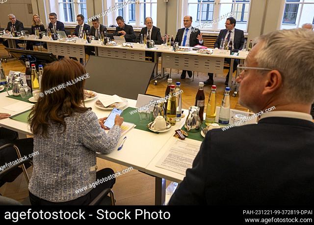 21 December 2023, Bavaria, Munich: Under the leadership of Albert Füracker, (3rd from right)(CSU) Minister of State for Finance and Home Affairs