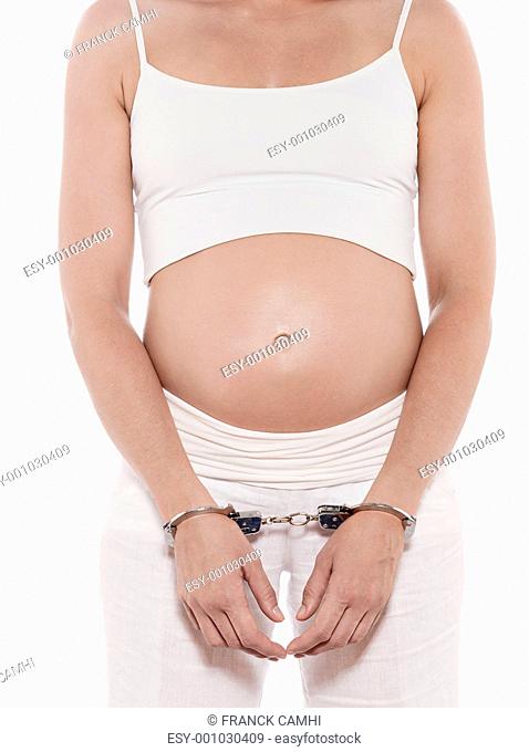 Pregnant Woman Hands Attached With Handcuffs