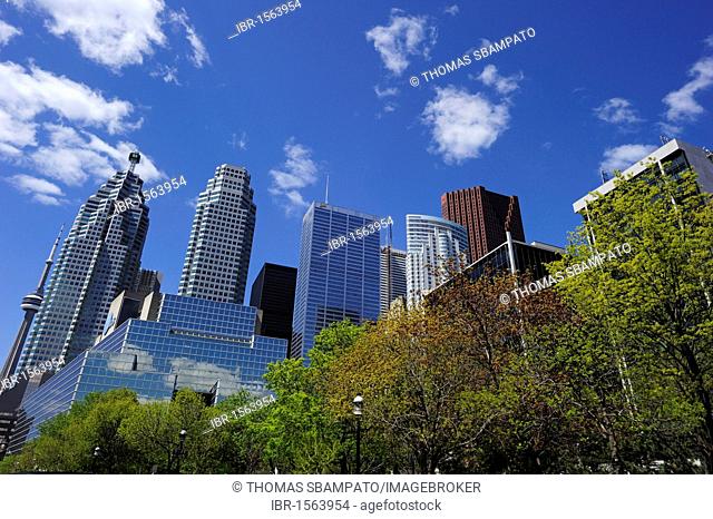 The office buildings on Front Street, on the left the landmark of Toronto, the 553m high CN Tower, Toronto, Ontario, Canada