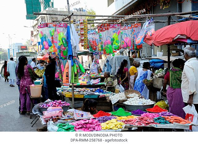 roadside shop selling pichkari holi festival, mumbai, maharashtra, India, Asia