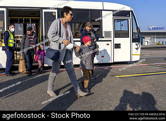 08 November 2022, Moldova, Chisinau: Sick Ukrainian children and their companions arrive for the relief flight at the airport in Chisinau