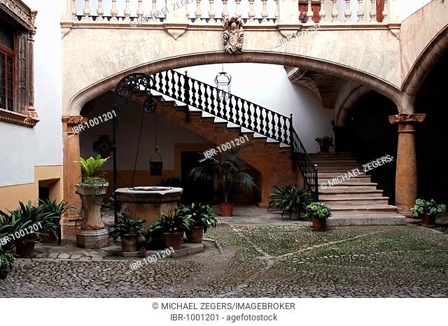 Stairway to a balcony with a balustrade in an inner courtyard, a Patio in the former city palace Can Oleza, historic city centre, Ciutat Antiga
