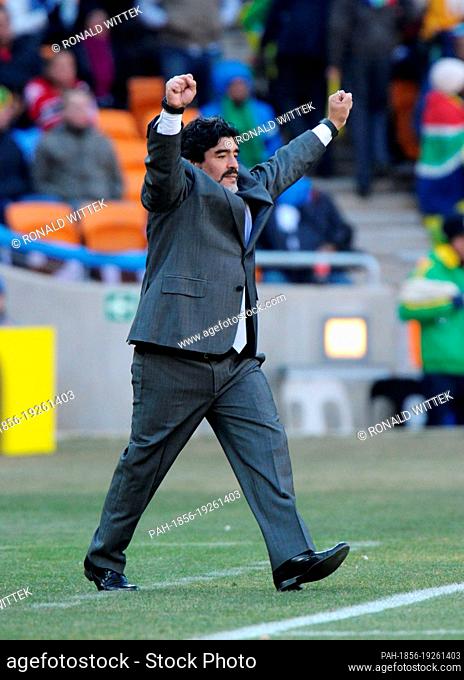 Headcoach Diego Armando Maradona of Argentina celebrates after the final whistle of the FIFA World Cup 2010 group B match between Argentina and South Korea at...