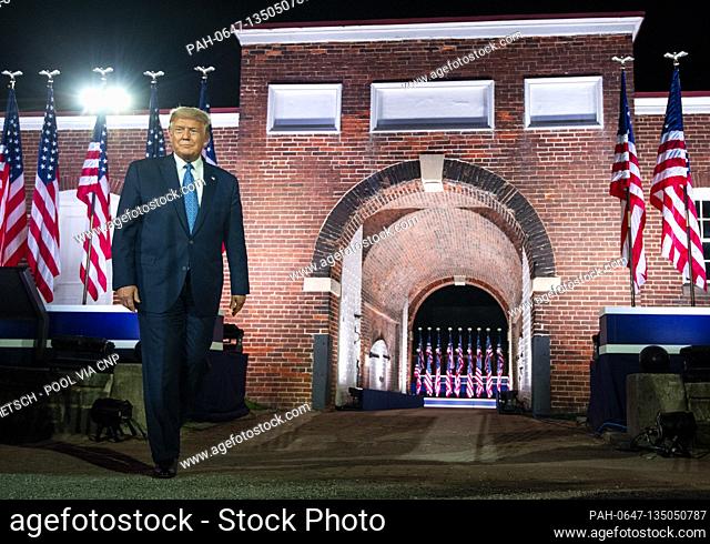 United States President Donald J. Trump arrives as Vice President Mike Pence delivers remarks on the third night of the Republican Nationals Convention at Ft