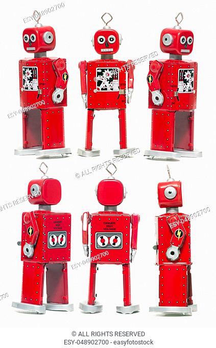 Vintage retro red tin toy robot isolated on a white background