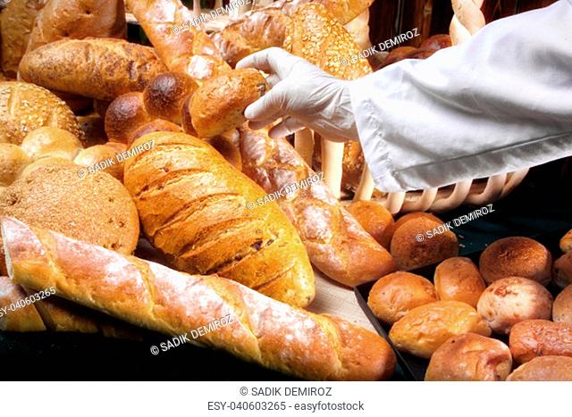 an image of variety of breads and chief