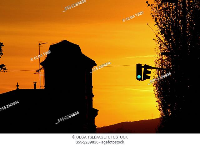House in the sunset and traffic light, Sant Just Desvern, Barcelona, Catalonia, Spain
