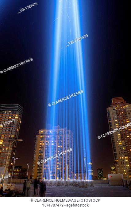 One of the beams of light of the Tribute in Light, an annual memorial to the events of September 11, 2001, shines into the night sky in New York City on Tuesday