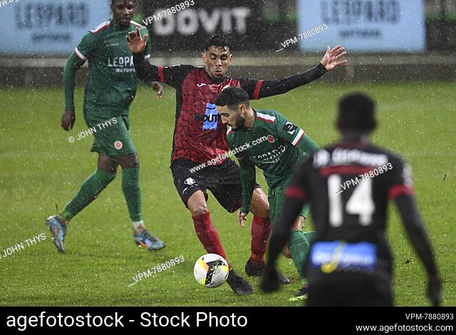 Rwdm's Igor De Camargo and Virton's Anas Hamzaoui fight for the ball during a soccer match between RE Virton and RWDM Racing White Daring Molenbeek