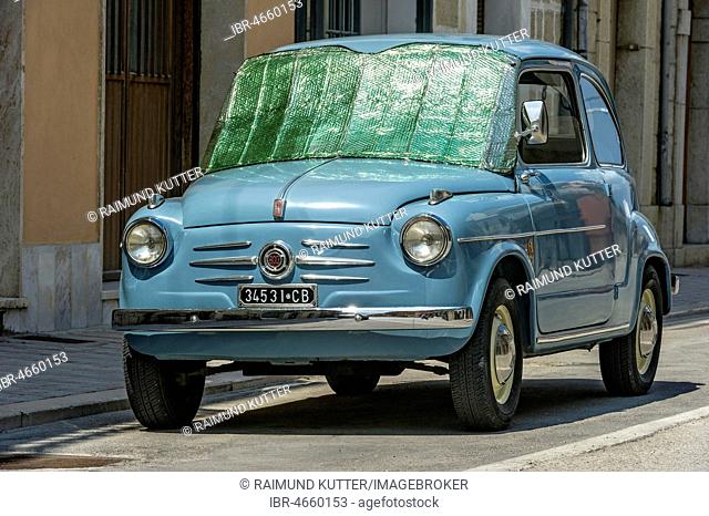 Blue FIAT 600, Seicento, oldtimer, with sun protection on windscreen, Molise, Italy
