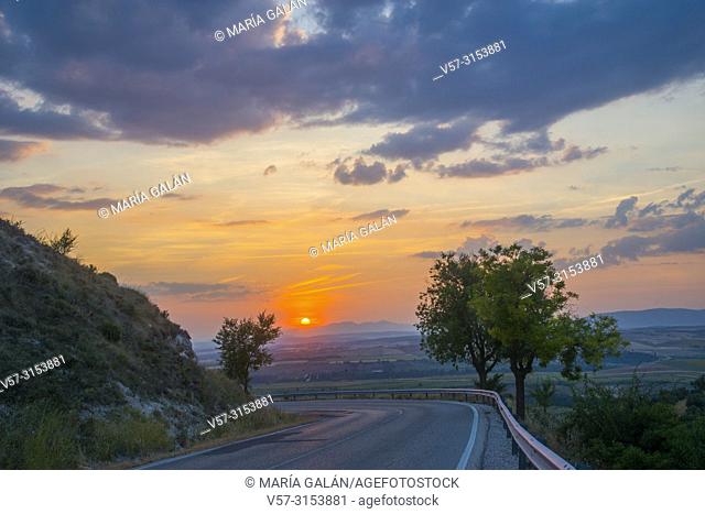 Road and sunset. Jadraque, Guadalajara province, Castilla La Mancha, Spain