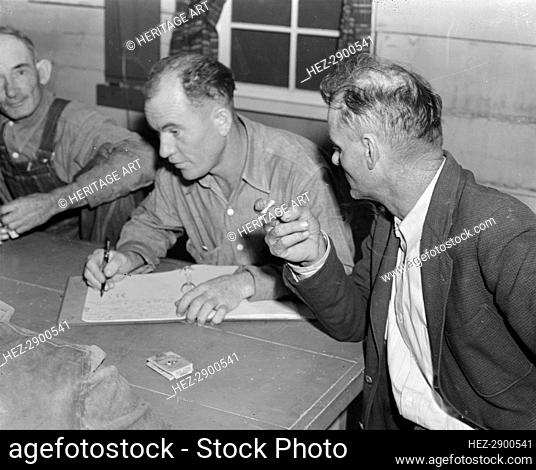 Meeting of the camp council, FSA camp, Farmersville, California, 1939. Creator: Dorothea Lange
