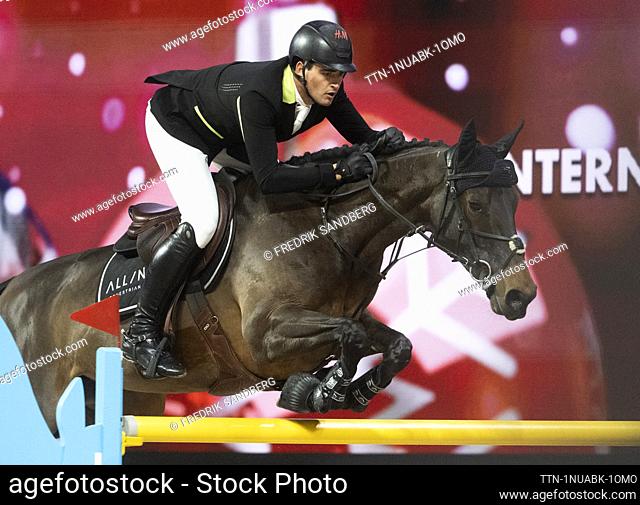 STOCKHOLM 20231201 Nicola Philippaerts of Belgium rides the horse Klaartje Z during the international jumping competition at the Sweden International Horse Show...