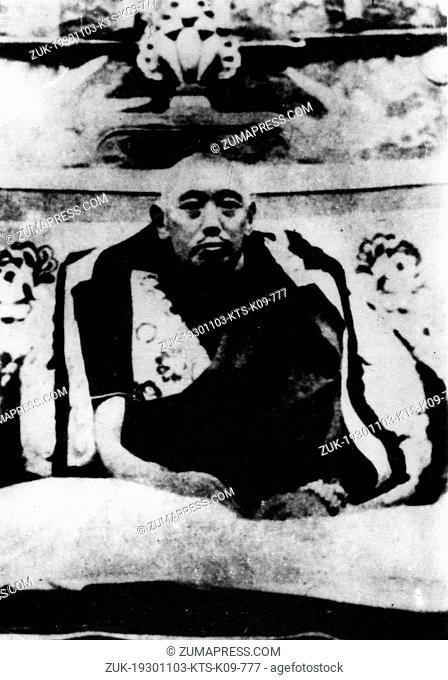 Nov. 3, 1930 - Tibet , China - Tibetan political leader THUBTEN GYATSO, the 13th DALAI LAMA (February 12, 1876 - December 17, 1933) sitting on his throne