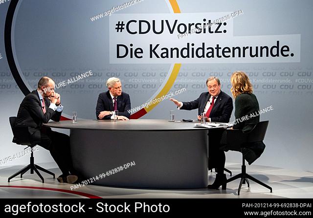 14 December 2020, Berlin: The three candidates for the chairmanship of the German CDU, Friedrich Merz (l-r), Norbert Röttgen and Armin Laschet sit together with...