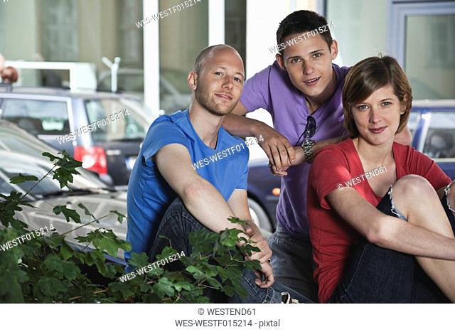 Germany, Berlin, Man and woman smiling, portrait