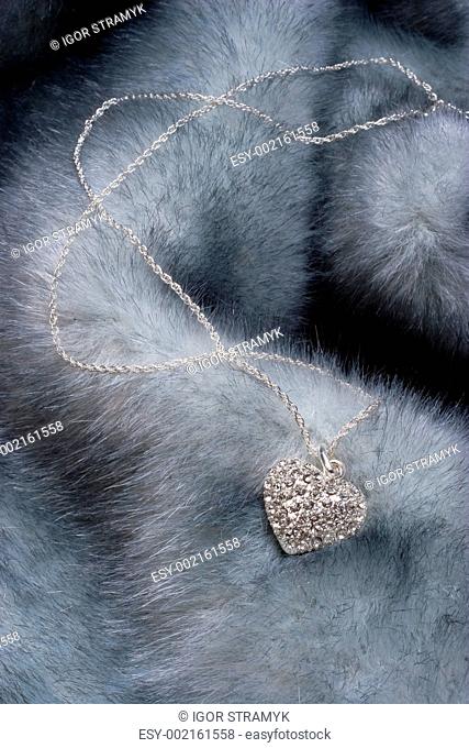 Chain with heart on fur