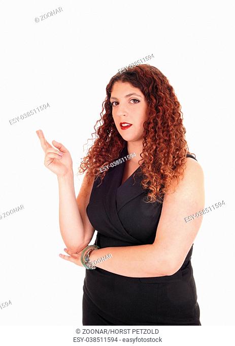 Portrait of a business woman crossing finger